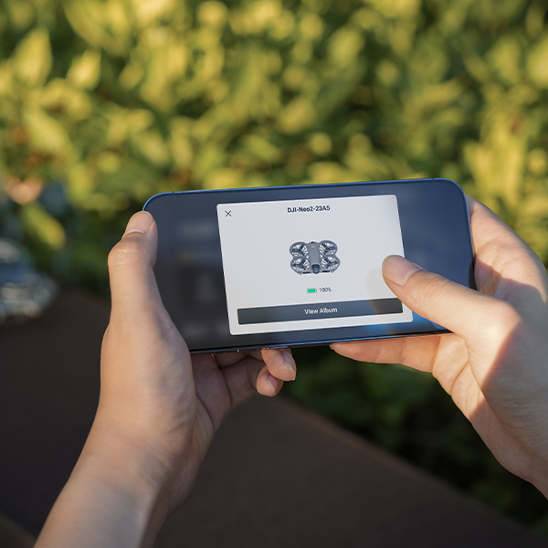 Person Holding Phone and using Quick Transfer Feature